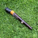 Jaguar Head Ceremonial Pipe | Peace Pipe | Made of Chonta Wood and Machu Picchu Stone | Decorated with Smoky Quartz and Feather