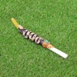 Tepi Applicator made of Llama Bone and Yellow Stone | Decorated with Healer Snake Figure, Peruvian Turquoise and Coca Leaf Figure