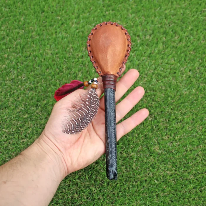 Skull Figure Shamanic Rattle | Handle part made of Machu Picchu Stone | Decorated with Domestic Feather | Peruvian Musical Instruments