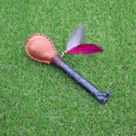 Trilogy Figure Shamanic Rattle | Handle part made of Machu Picchu Stone | Decorated with Domestic Feather | Peruvian Musical Instruments